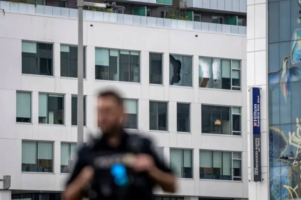 MONTREAL, CANADA - JUNE 22: Windows are allegedly shot out at the scene of an earlier active shooter situation on June 22, 2026 in Montreal, Canada. The active shooter situation has since ended. According to reports, a police officer was killed in a shootout, and a suspect was also killed at the scene. (Photo by Andrej Ivanov/Getty Images)