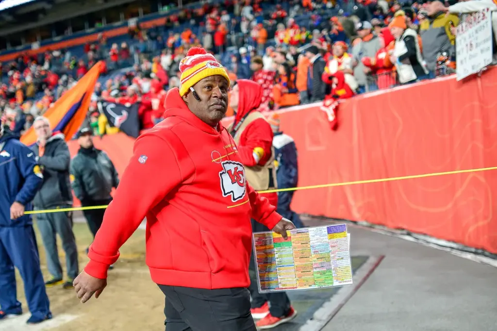 Kansas City Chiefs v Denver Broncos DENVER, COLORADO - JANUARY 08: Offensive coordinator Eric Bieniemy of the Kansas City Chiefs exits the field after defeating the Denver Broncos 28-24 at Empower Field At Mile High on January 08, 2022 in Denver, Colorado. (Photo by Dustin Bradford/Getty Images)