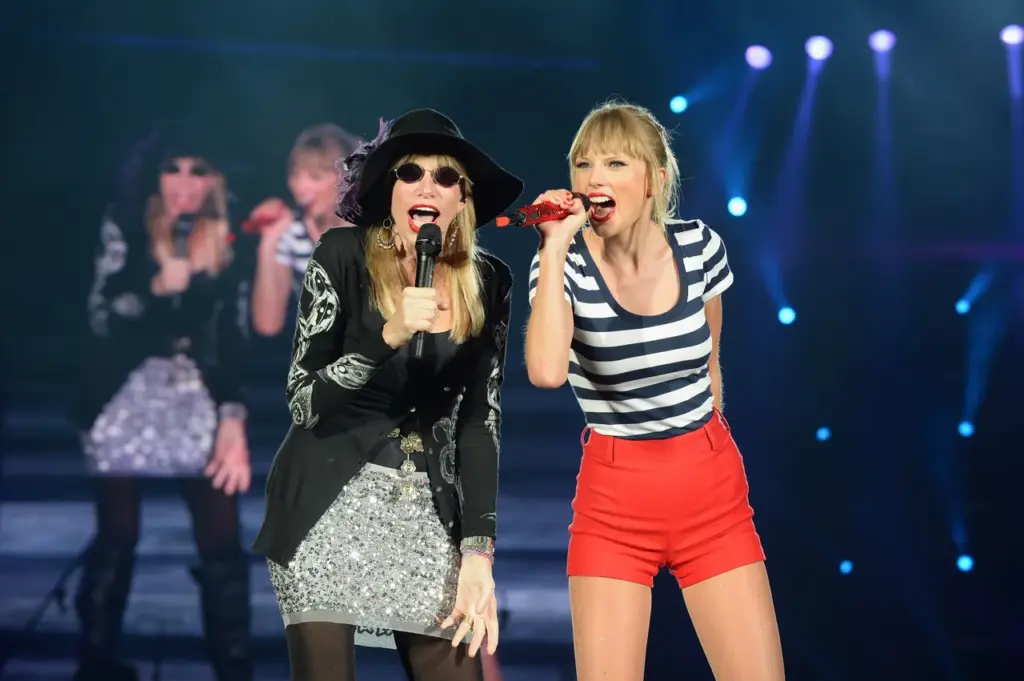 Taylor Swift's RED Tour - Boston FOXBORO, MA - JULY 27: (EDITORIAL USE ONLY. NO STANDALONE PUBLICATION USE (NO SPECIAL INTEREST OR SINGLE ARTIST PUBLICATION USE; NO BOOK USE)) Carly Simon joined Taylor Swift onstage tonight at Gillette Stadium in Foxborough, Mass. in front of a sold-out crowd of more than 55,000 fans for a special duet performance of her iconic hit Youre So Vain. (Photo by Theo Wargo/TAS/Getty Images for TAS)