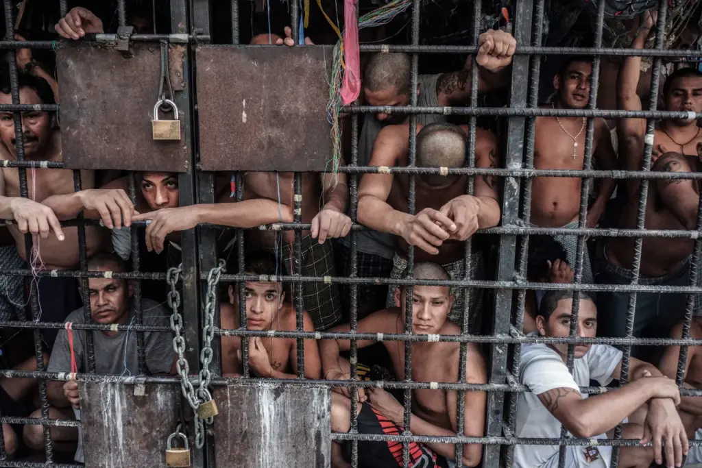 SAN SALVADOR, EL SALVADOR - MAY 20: MS-13 gang members languish in one of the three 'gang cages' in the Quezaltepeque police station May 20, 2013 in San Salvador, El Salvador. (Photo by Giles Clarke/Getty Images.)