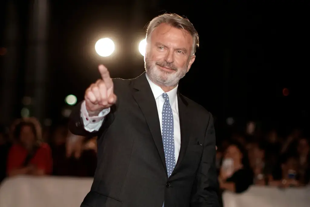 Actor Sam Neill arrives for the premiere of