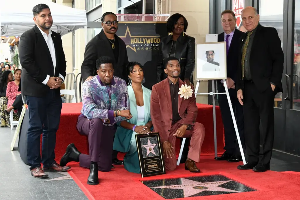 US-ENTERTAINMENT-HWOF-BOSEMAN (L/R, top row) LA City Council member Hugo Soto-Martinez, US filmmaker Ryan Coogler, US actress Viola Davis, Jerry Neuman, Executive Committee Member, Hollywood Chamber of Commerce and Steven Nissen, President & CEO, Hollywood Chamber of Commerce, (L/R, bottom row) late US actor Chadwick Boseman's brother Derrick Boseman, widow Taylor Simone Ledward and brother Kevin Boseman, pose during the late actor's posthumous Hollywood Walk of Fame Star ceremony in Los Angeles, California, on November 20, 2025. Boseman died on August 29, 2020, at the age of 43 after a private four-year battle with colon cancer. (Photo by Unique Nicole / AFP) (Photo by UNIQUE NICOLE/AFP via Getty Images)
