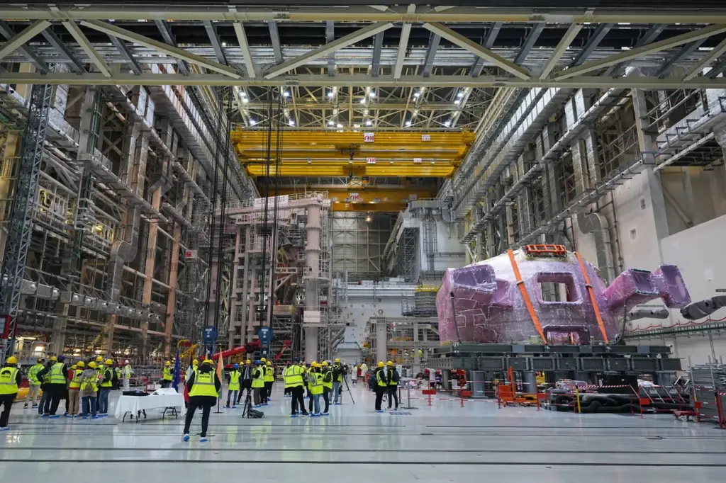 A delegation of visitors with French President and Indian Prime Minister visits the ITER (International Thermonuclear Experimental Reactor) in Saint-Paul-les-Durance, near Marseille southern France, on February 12, 2025. French President Emmanuel Macron and Indian Prime Minister Narendra Modi visit this Iter colossal construction site on February 12, 2025, located in the southeast of France, which aims to reproduce on Earth the nuclear fusion that powers the Sun and other stars.