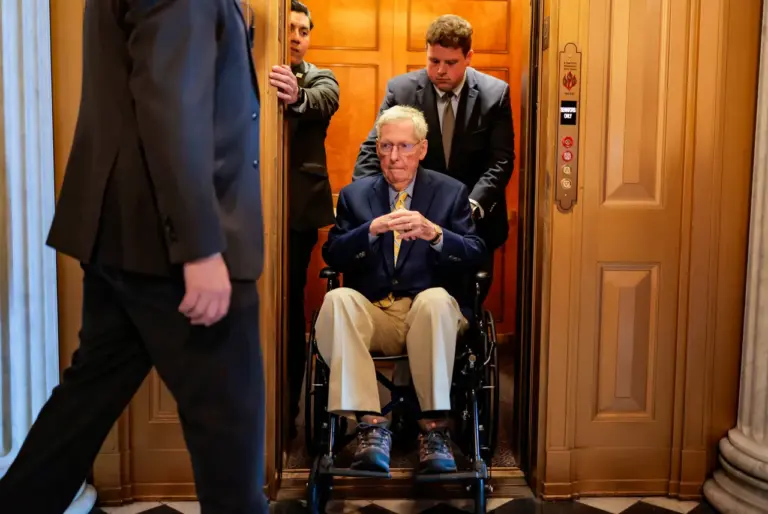 WASHINGTON, DC - APRIL 13: U.S. Sen. Mitch McConnell (R-KY) is pushed in a wheelchair during a vote at the U.S. Capitol Building on April 13, 2026 in Washington, DC. Members of both the Senate and House of Representatives return to DC this week after recess for Easter and Passover. (Photo by Heather Diehl/Getty Images)