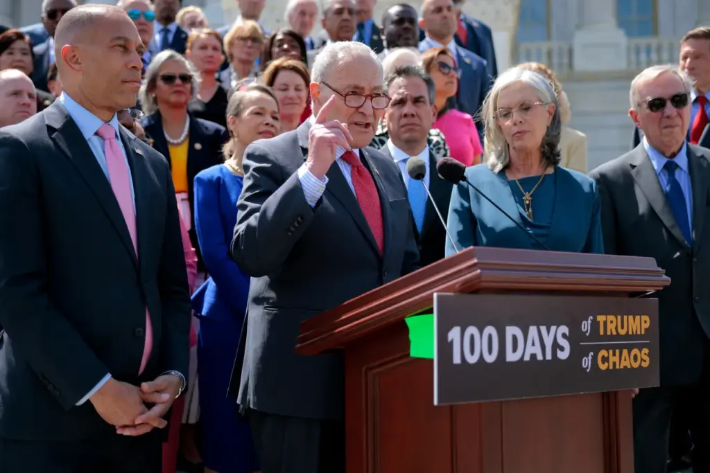 WASHINGTON, DC - APRIL 30: Senate Minority Leader Charles Schumer (D-NY) (C), House Minority Leader Hakeem Jeffries (D-NY) (L) and fellow Democratic lawmakers mark the first 100 days of President Donald Trump's second term in the White House outside the U.S. Capitol on April 30, 2025 in Washington, DC. Democrats have been highly critical of the scope and methods of Trump's work to transform the federal government, including sweeping tariffs, clashing with colleges and universities, shrinking of the federal workforce, and attacking the judiciary and journalists. (Photo by Chip Somodevilla/Getty Images)