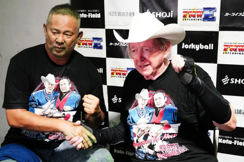 Pro-Wrestling - Atsushi Onita 50th Anniversary KAWASAKI, JAPAN - AUGUST 24: Osamu Nishimura and Dory Funk Jr. shake hands during the Pro-Wrestling - Atsushi Onita 50th Anniversary at Fujitsu Stadium Kawasaki on August 24, 2024 in Kawasaki, Kanagawa, Japan. (Photo by Etsuo Hara/Getty Images)